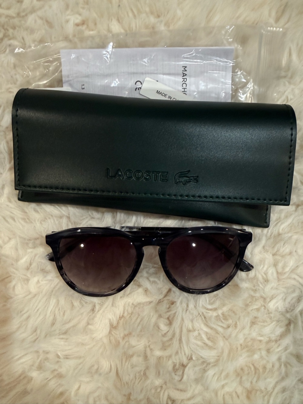Lacoste Black Round Sunglasses with Dark Gradient Lenses